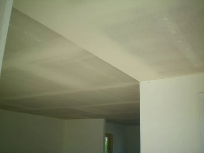 Plaster wall repaired and finished to match